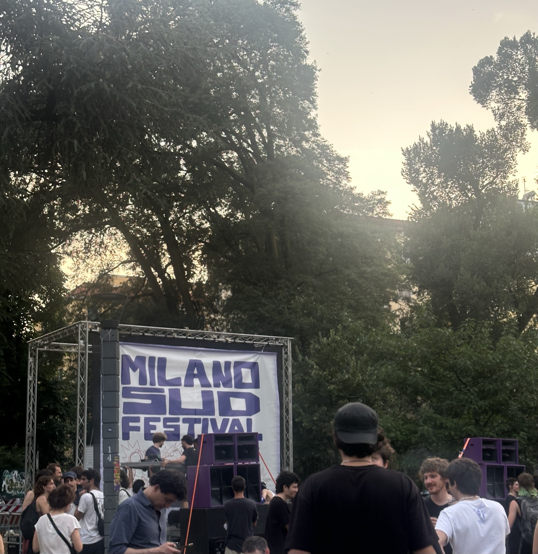 The Milano Sud Festival stage and crowd under the trees of Parco Ravizza